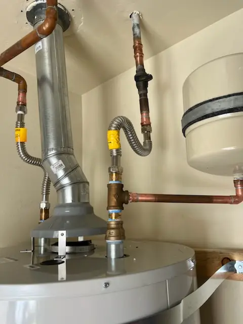 Water heater installation and plumbing repair in Rainier